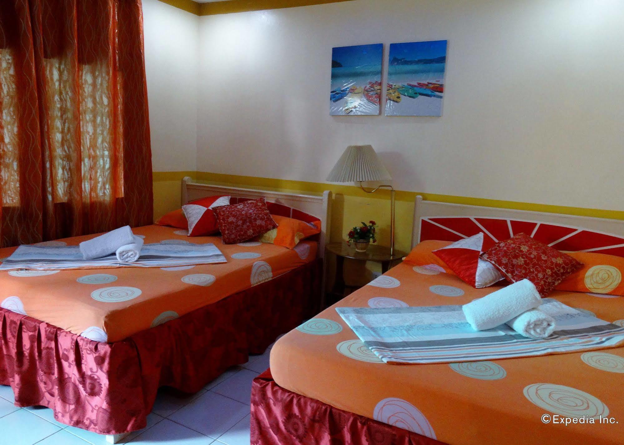 D'Lucky Garden Inn & Suites Tiniguiban Esterno foto