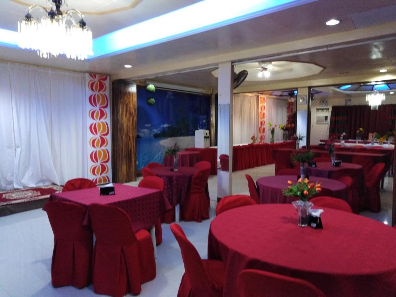 D'Lucky Garden Inn & Suites Tiniguiban Esterno foto