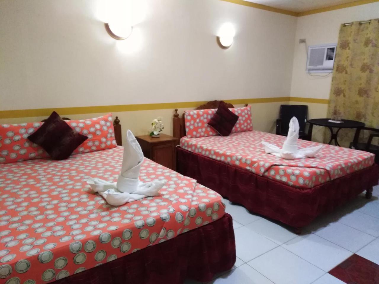 D'Lucky Garden Inn & Suites Tiniguiban Esterno foto